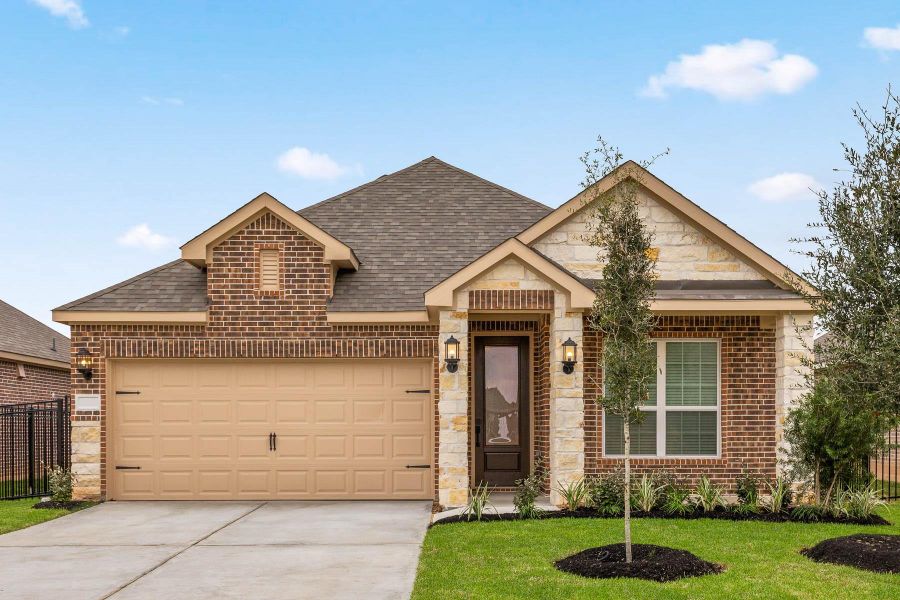 Front exterior of a new home in Sunterra, Katy, TX, highlighting curb appeal (Image 1). Front exterior of a new home in Sunterra, Katy, TX, highlighting curb appeal (Image 1).