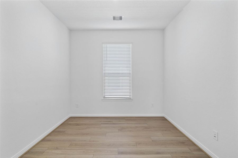 The Den offers a versatile space that seamlessly expands your living options—perfect for a home office, playroom, media space, or whatever suits your lifestyle. The Den features vinyl plank flooring, custom neutral tone paint, high ceilings, and a large window with privacy blinds.