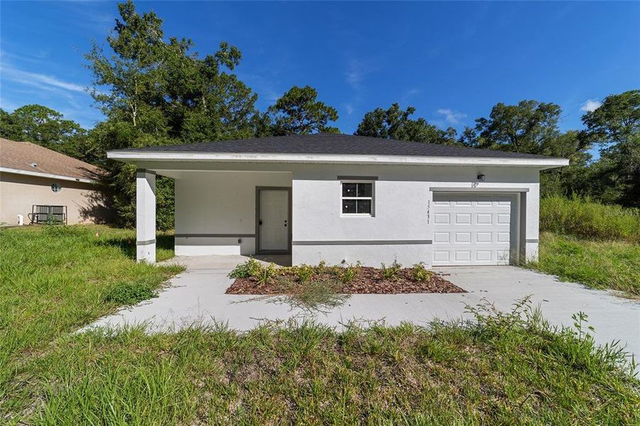 Front exterior of a new home in , Ocala, FL, highlighting curb appeal (Image 17). Front exterior of a new home in , Ocala, FL, highlighting curb appeal (Image 17).