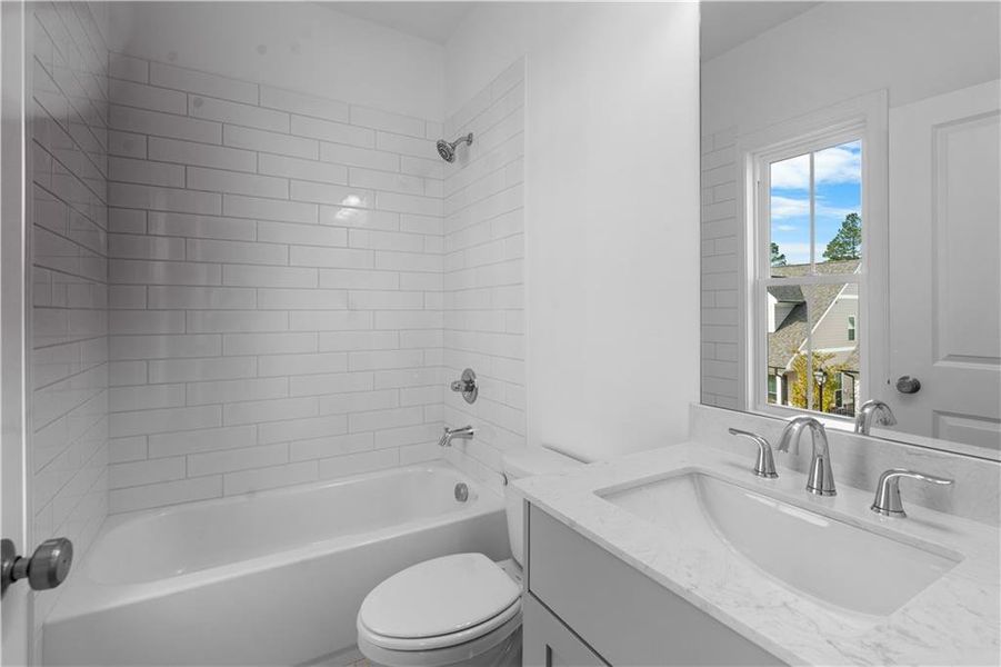 Furnished interior view inside a new home in Evanshire Townhomes, Duluth (Image 12). Furnished interior view inside a new home in Evanshire Townhomes, Duluth (Image 12).