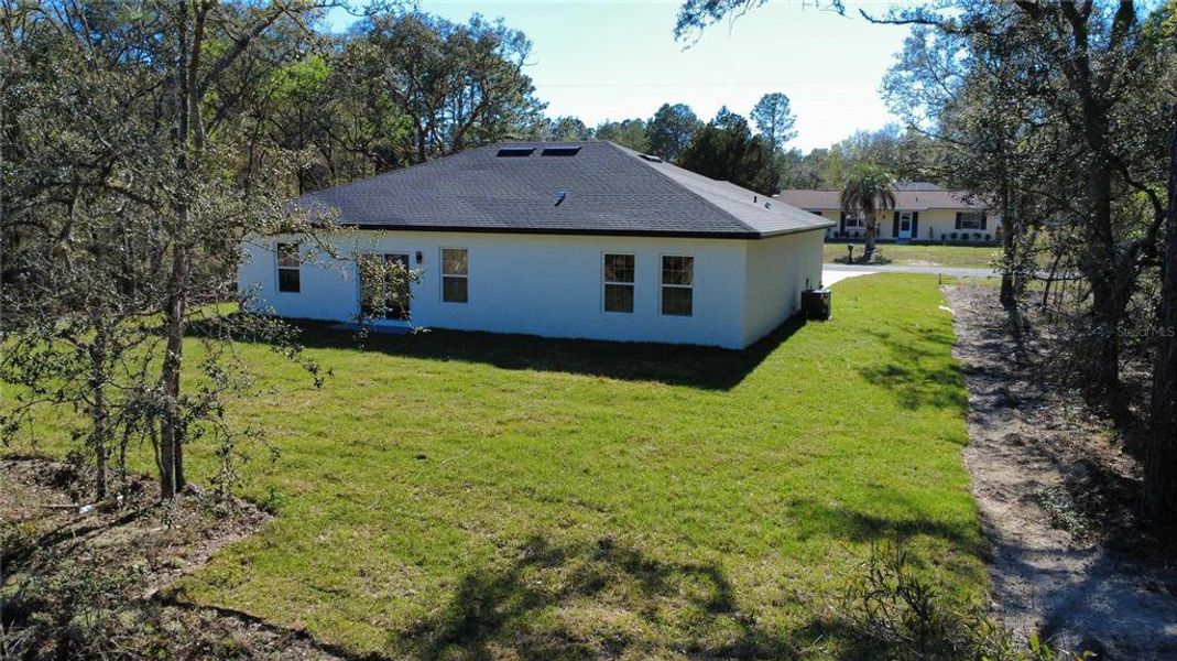 Exterior details and patio area of a home in , Citrus Springs (Image 19).
