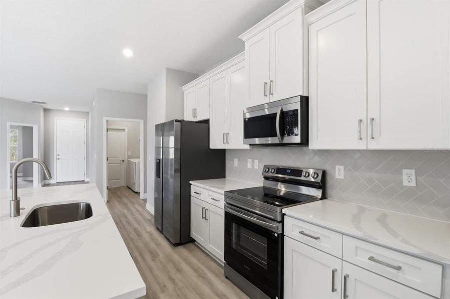Furnished interior view inside a new home in , Ocala (Image 13).