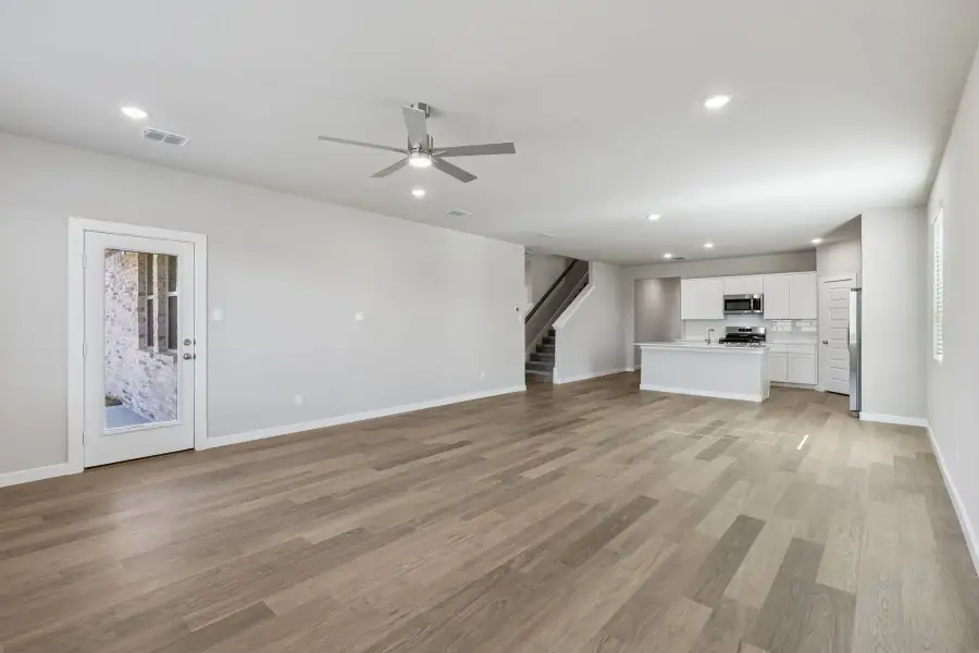 Open First Floor in the Holden home plan by Trophy Signature Homes – REPRESENTATIVE PHOTO