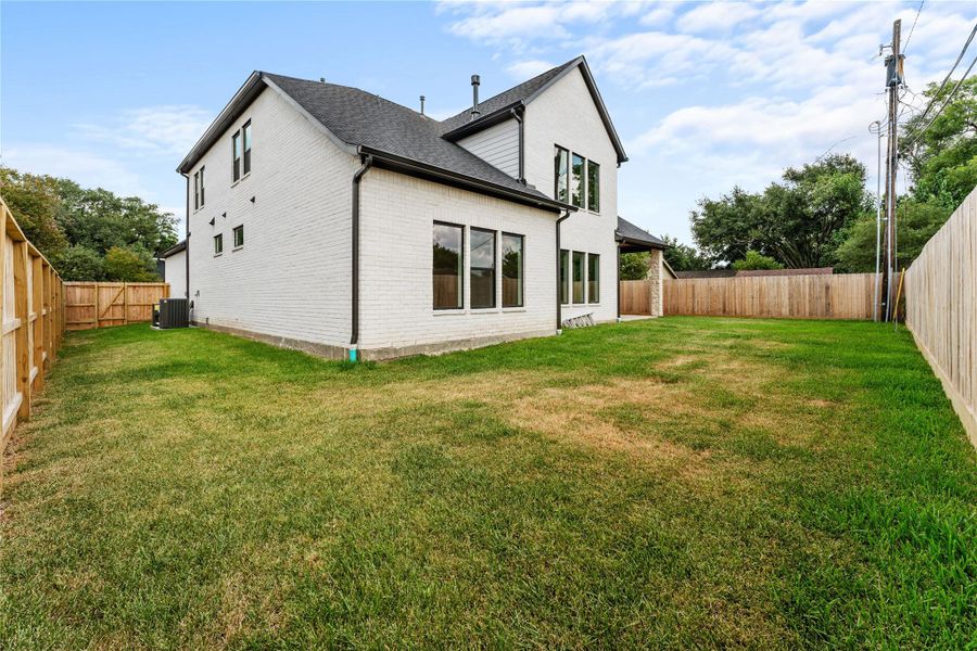 Front exterior of a new home in , Houston, TX, highlighting curb appeal (Image 21). Front exterior of a new home in , Houston, TX, highlighting curb appeal (Image 21).
