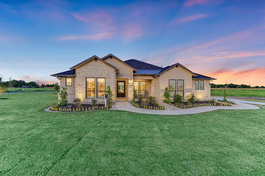 Representative exterior photo of a completed home built from the Bandera II by Giddens Homes in Leander Estates, Leander, TX (Image 2).