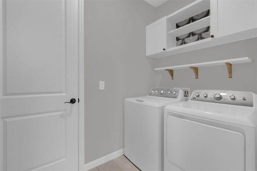 Furnished interior view inside a new home in Seasons at Lakeside Forest, Tavares (Image 33).