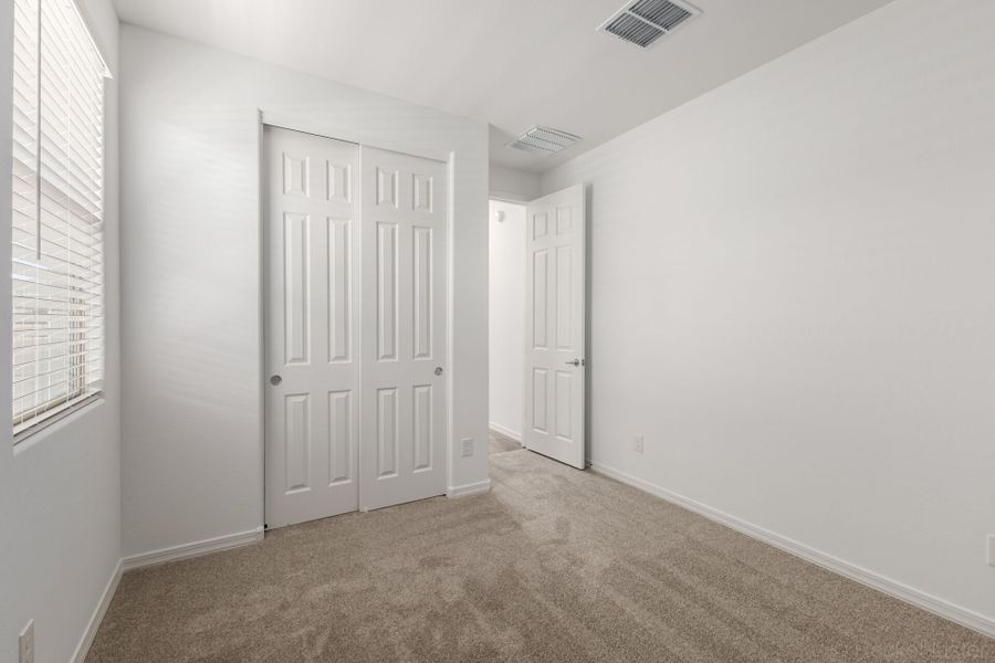 Spacious, unfurnished interior of a new home in Empire Pointe, Queen Creek (Image 12).