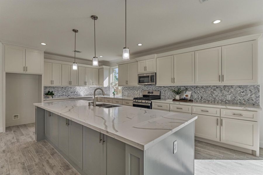 Beautifully and thoughtfully designed, this kitchen was built for ease of everyday living and entertaining. Beautifully and thoughtfully designed, this kitchen was built for ease of everyday living and entertaining.