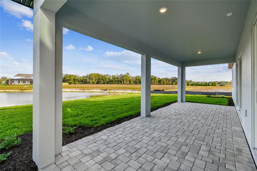 Exterior details and patio area of a home in Creeks Edge at Twin Rivers, Parrish (Image 3). Exterior details and patio area of a home in Creeks Edge at Twin Rivers, Parrish (Image 3).