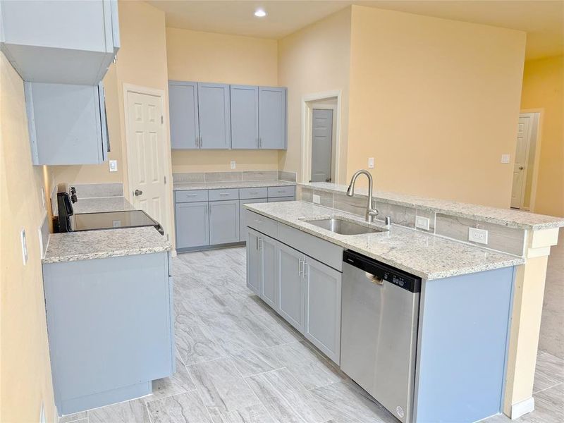 Kitchen with dishwasher, light stone counters, electric range, gray cabinetry, and recessed lighting