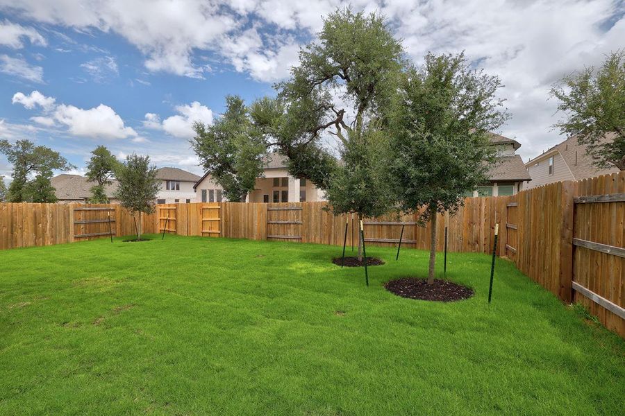 Exterior details and patio area of a home in Parkside On The River, Georgetown (Image 20).