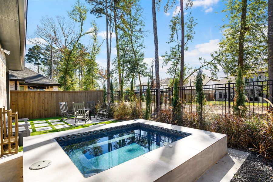 Exterior details and patio area of a home in The Highlands - Grove Collection, Porter (Image 4).