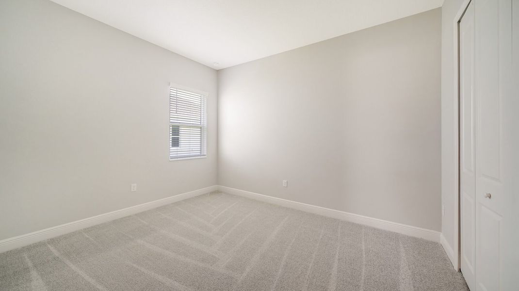 Spacious, unfurnished interior of a new home in Wildleaf at North River Ranch, Parrish (Image 25).