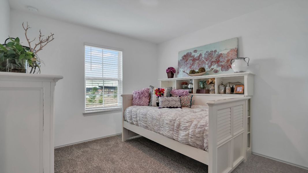 Representative furnished interior of a home built from the MITCHELL by D.R. Horton in Westward Pointe, Sealy (Image 16).