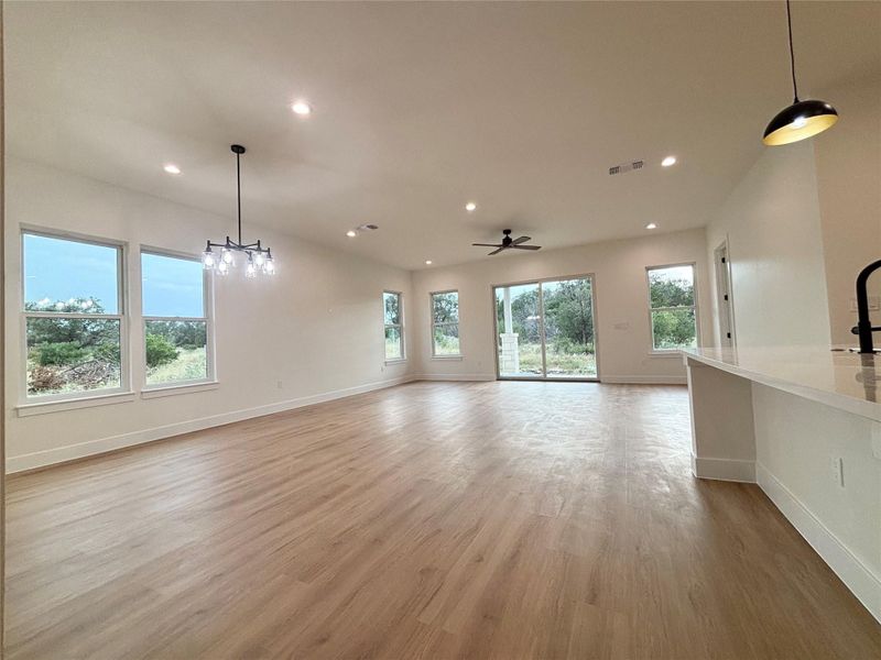 A spacious, open-concept living area with abundant natural light and modern fixtures awaits. A spacious, open-concept living area with abundant natural light and modern fixtures awaits.