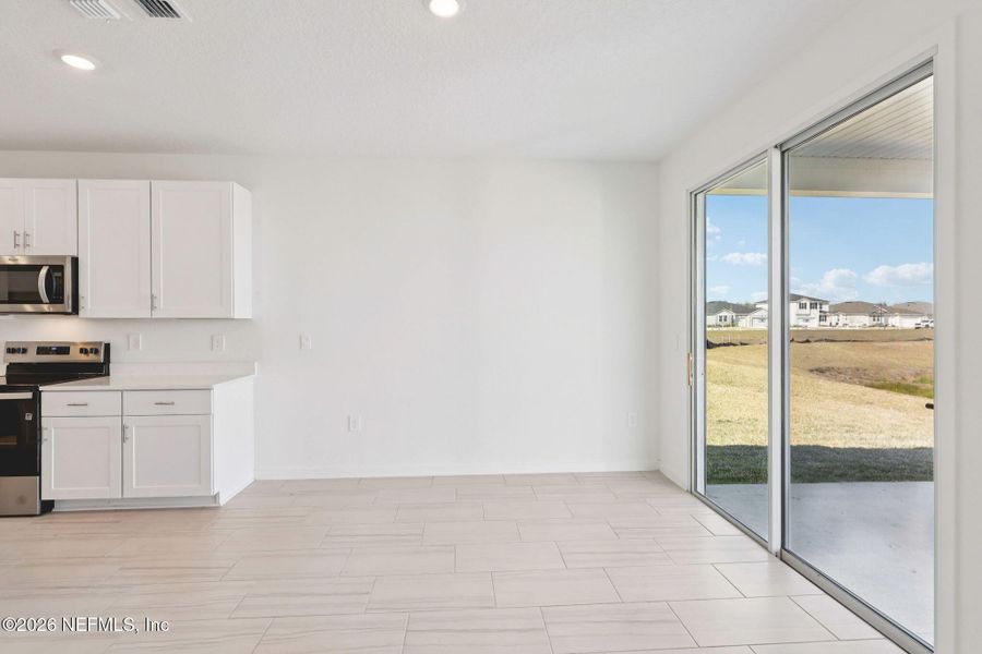 Spacious, unfurnished interior of a new home in Lakes at Bella Lago - Signature Series, Green Cove Springs (Image 29).