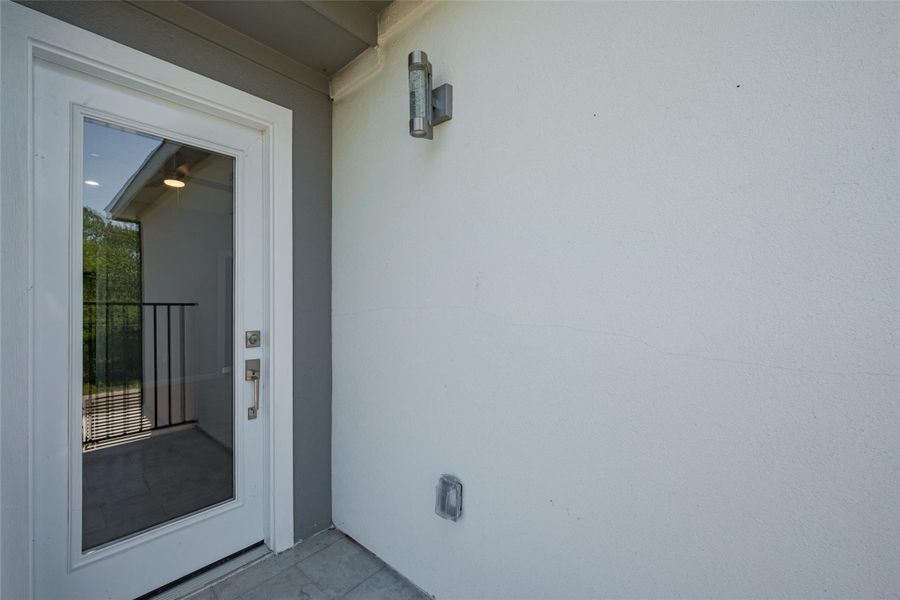 Exterior details and patio area of a home in , Houston (Image 28).