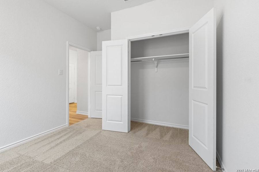 Spacious, unfurnished interior of a new home in Hidden Bluffs at TRP, San Antonio (Image 23).