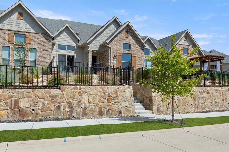 Front exterior of a new home in Cottonwood Creek, Wylie, TX, highlighting curb appeal (Image 22).