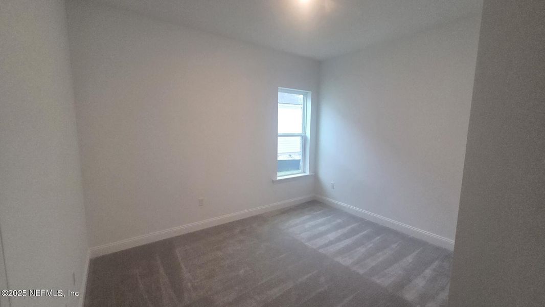 Spacious, unfurnished interior of a new home in , St. Johns (Image 24).