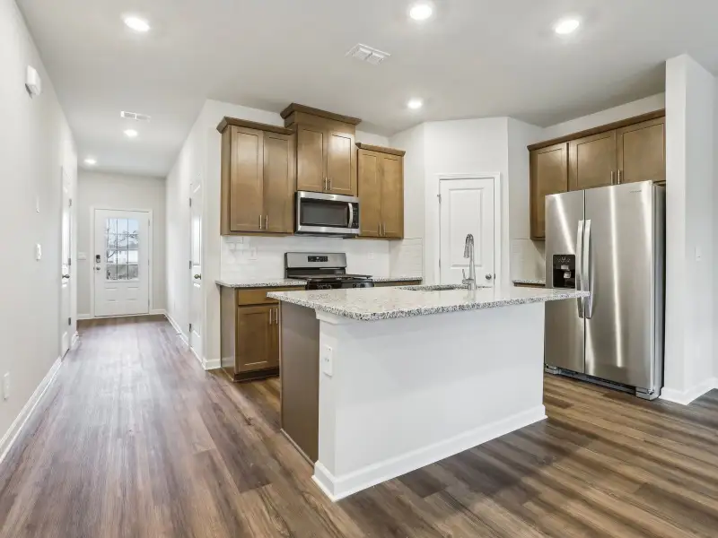 Furnished interior view inside a new home in Brooks Lake, Loganville (Image 5).