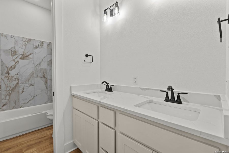 Furnished interior view inside a new home in , Devine (Image 6).