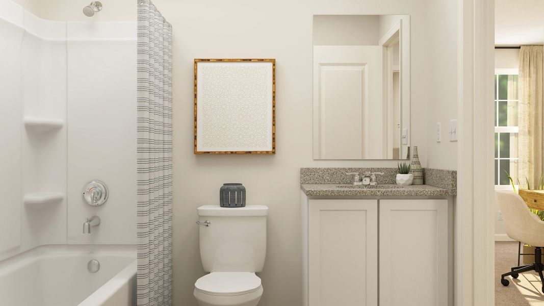 A bathroom with a tub sink and toilet.