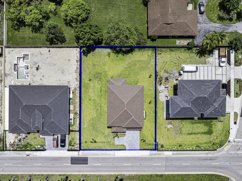 Front exterior of a new home in , Miami, FL, highlighting curb appeal (Image 1).