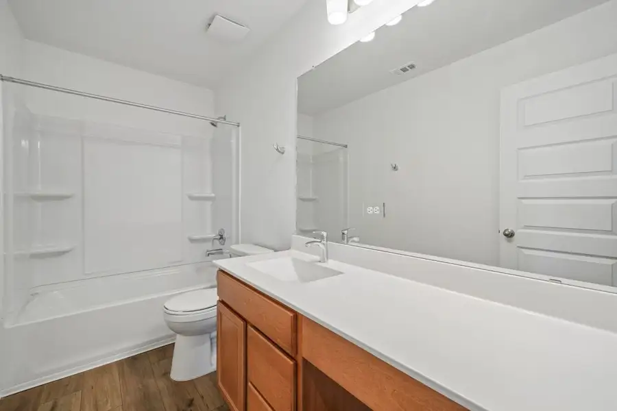 Furnished interior view inside a new home in Preserve at Culebra - Sterling Collection, San Antonio (Image 13).