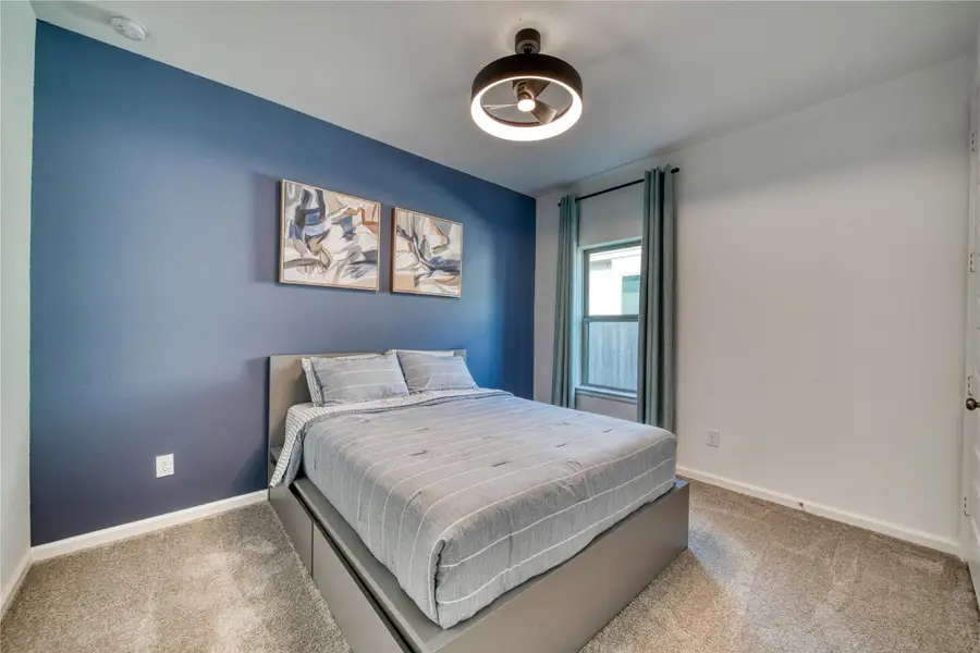 Furnished interior view inside a new home in Meridiana 40'/45', Manvel (Image 15).