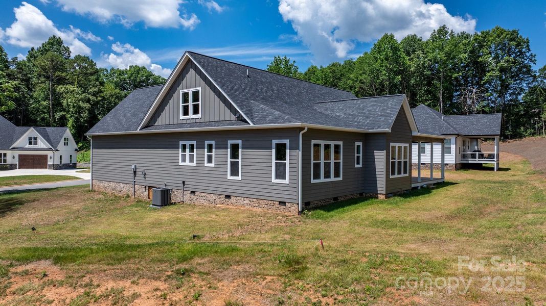 Front exterior of a new home in , Hickory, NC, highlighting curb appeal (Image 26).
