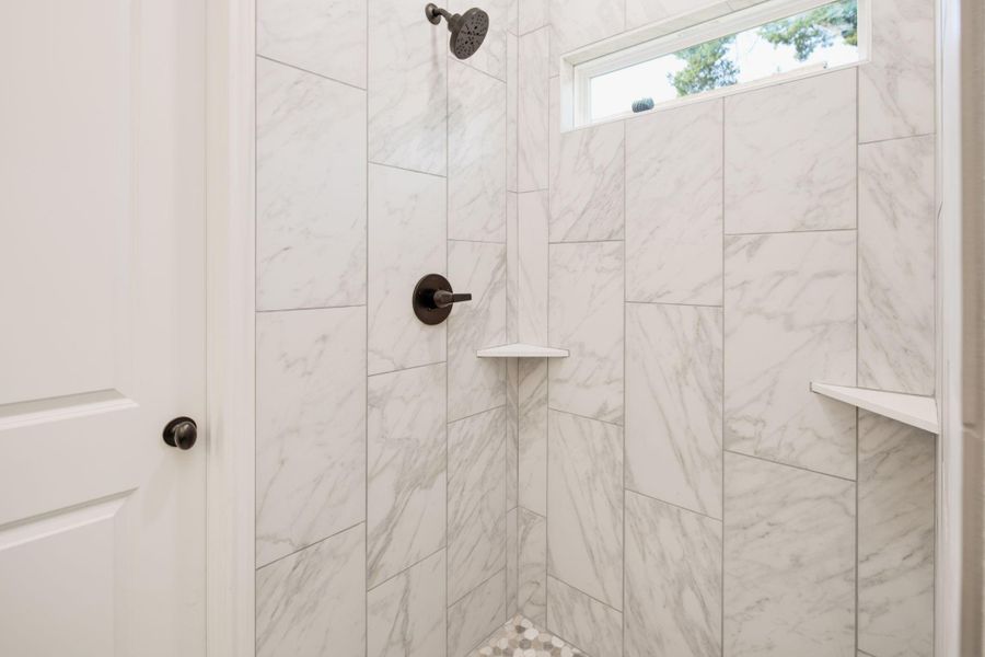 **Photos are of a previously built home with the same floorplan. Finishes are similar but not exact.