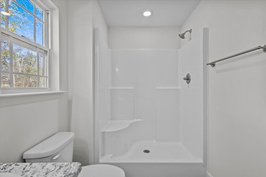 Representative furnished interior of a home built from the Roebuck by Enchanted Homes in Las Palomas Country Club Estates, La Vernia (Image 13).