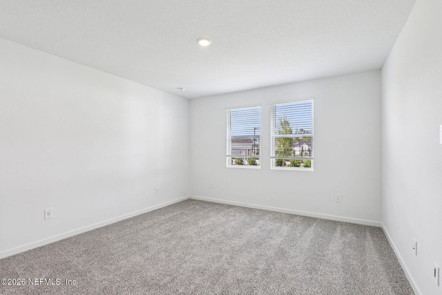 Spacious, unfurnished interior of a new home in Flagler Village - Signature Series, Palm Coast (Image 16). Spacious, unfurnished interior of a new home in Flagler Village - Signature Series, Palm Coast (Image 16).