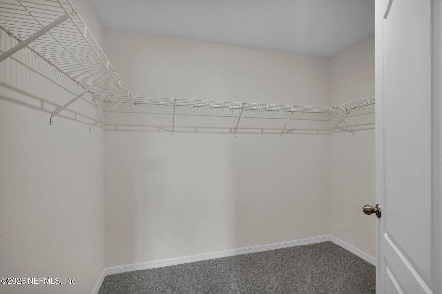 Spacious, unfurnished interior of a new home in Rolling Hills, Green Cove Springs (Image 21).