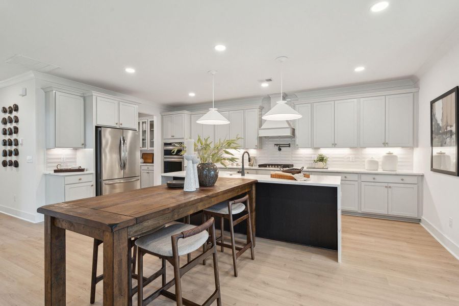 Furnished interior view inside a new home in Tidewater at Lakes of Cane Bay, Summerville (Image 33).