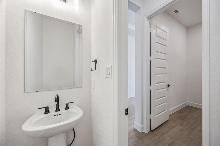 Furnished interior view inside a new home in Artavia, Conroe (Image 8).