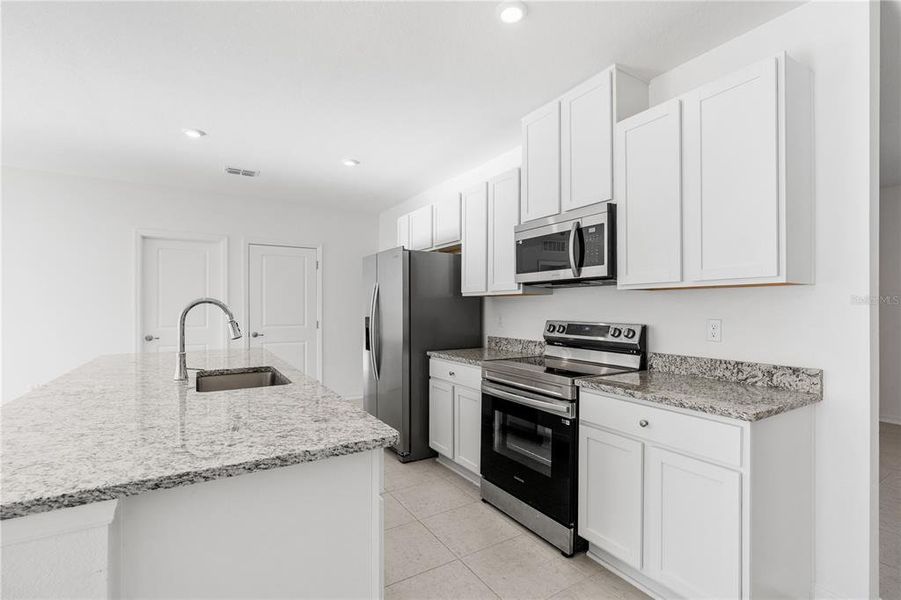 Furnished interior view inside a new home in Palm Coast, Palm Coast (Image 9). Furnished interior view inside a new home in Palm Coast, Palm Coast (Image 9).