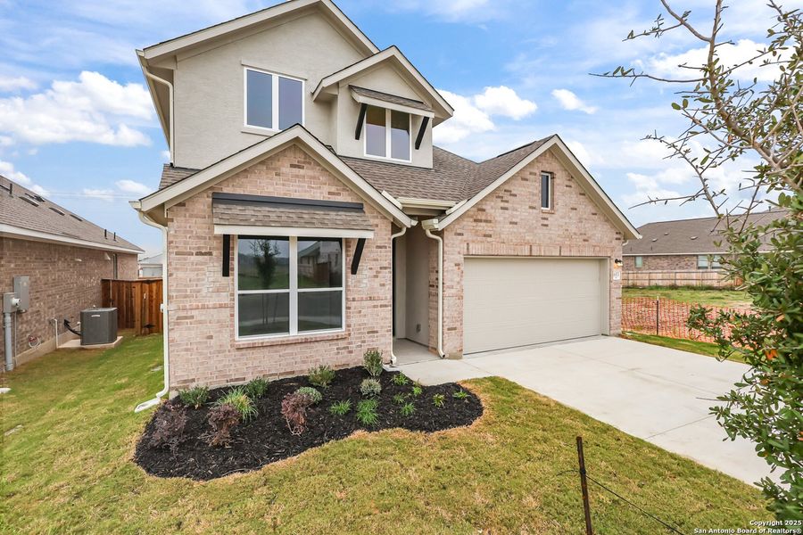 Front exterior of a new home in Sunflower Ridge, New Braunfels, TX, highlighting curb appeal (Image 21).