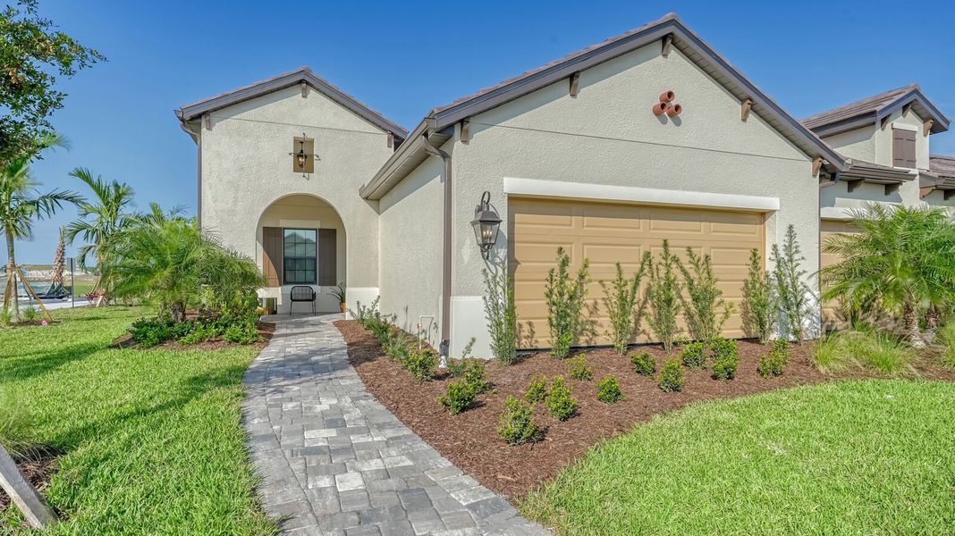 Representative exterior photo of a completed home built from the Sandcastle 2 by Neal Communities in Vistera of Venice, Venice, FL (Image 2).