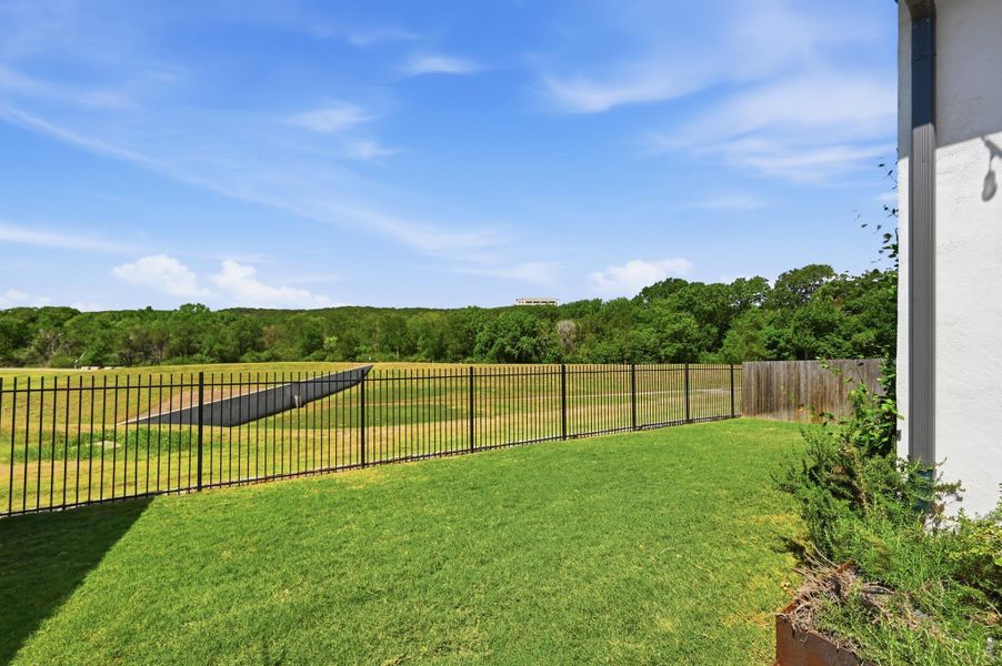 Exterior details and patio area of a home in Loyola, Austin (Image 22).