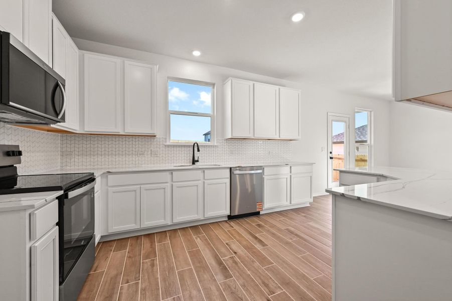 Furnished interior view inside a new home in Creekside at Estancia, Austin (Image 7).