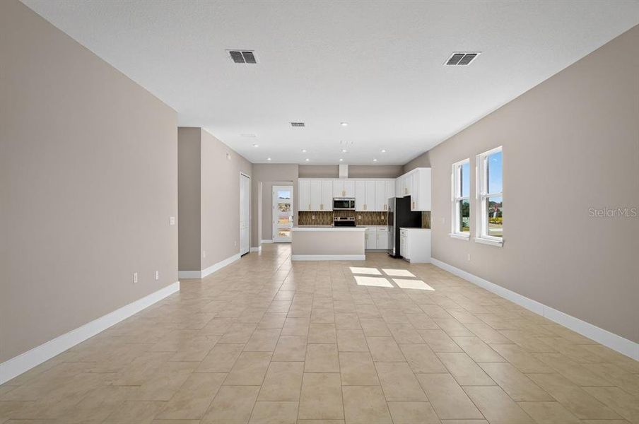 Spacious, unfurnished interior of a new home in Gray Hawk at Hole Two, Daytona Beach (Image 41).