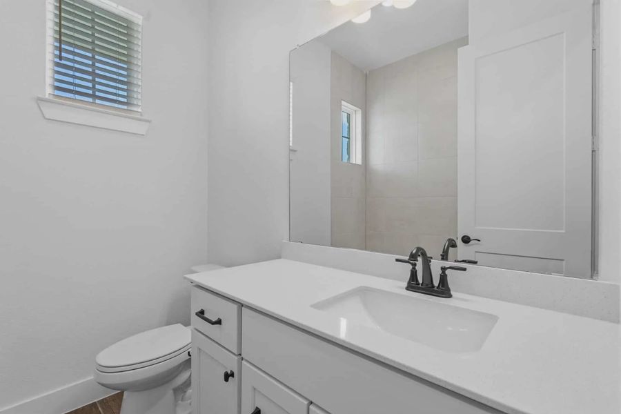Representative furnished interior of a home built from the Sorenstam by Chesmar Homes in Riceland Alley Loads, Mont Belvieu (Image 16).