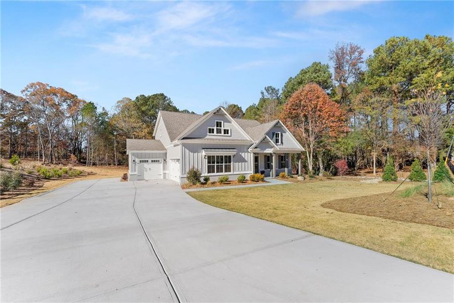 Front exterior of a new home in , Gainesville, GA, highlighting curb appeal (Image 30).