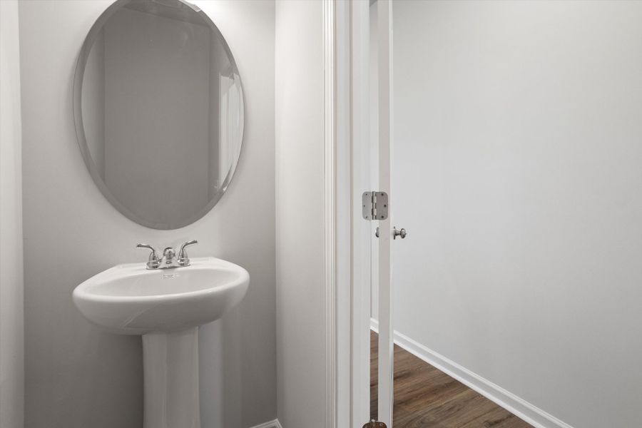 Furnished interior view inside a new home in West Main Townhomes, Sanford (Image 5).