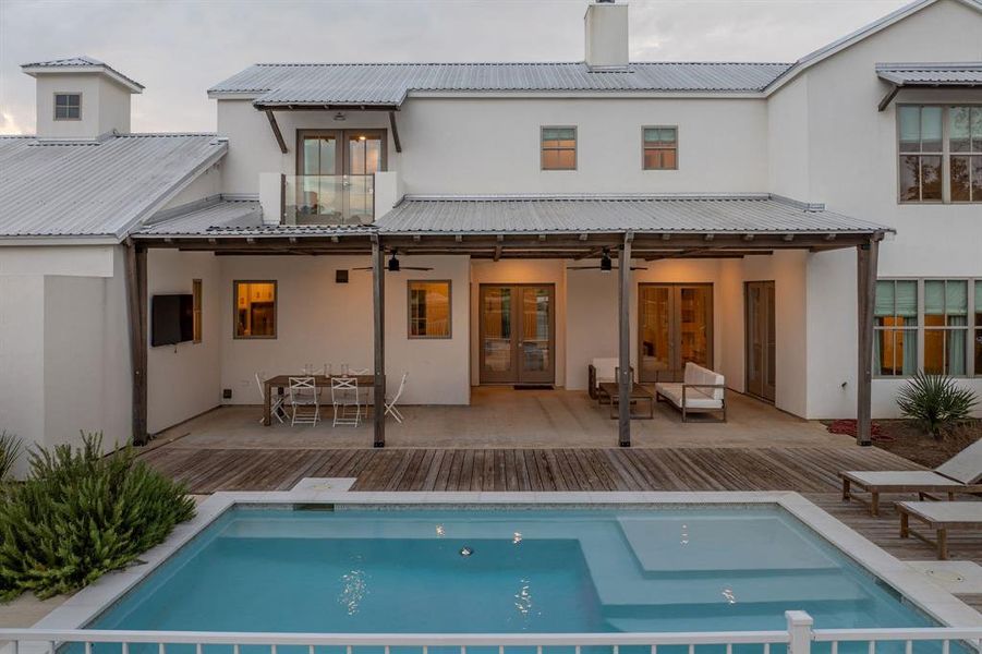 Bird's eye view of a nearby body of water and a tree filled landscape Bird's eye view of a nearby body of water and a tree filled landscape