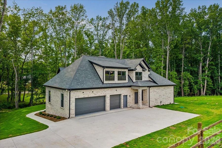 Front exterior of a new home in , Waxhaw, NC, highlighting curb appeal (Image 28).