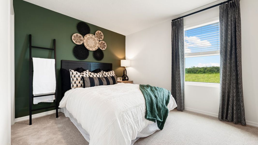 Furnished interior view inside a new home in The Towns at Firethorn, Parrish (Image 11).