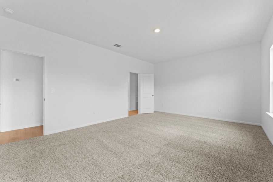 Spacious, unfurnished interior of a new home in Bar W Ranch, Leander (Image 36).